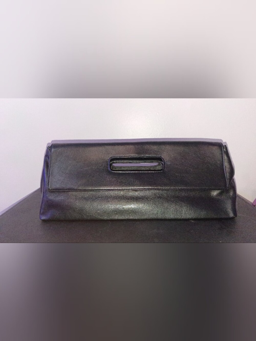 Sleek Black Leather Wristlet Clutch with Integrated Top Handle
